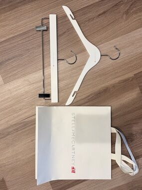 Stella McCartney H&M White Branded Shopping Bag with White Wooden Hangers